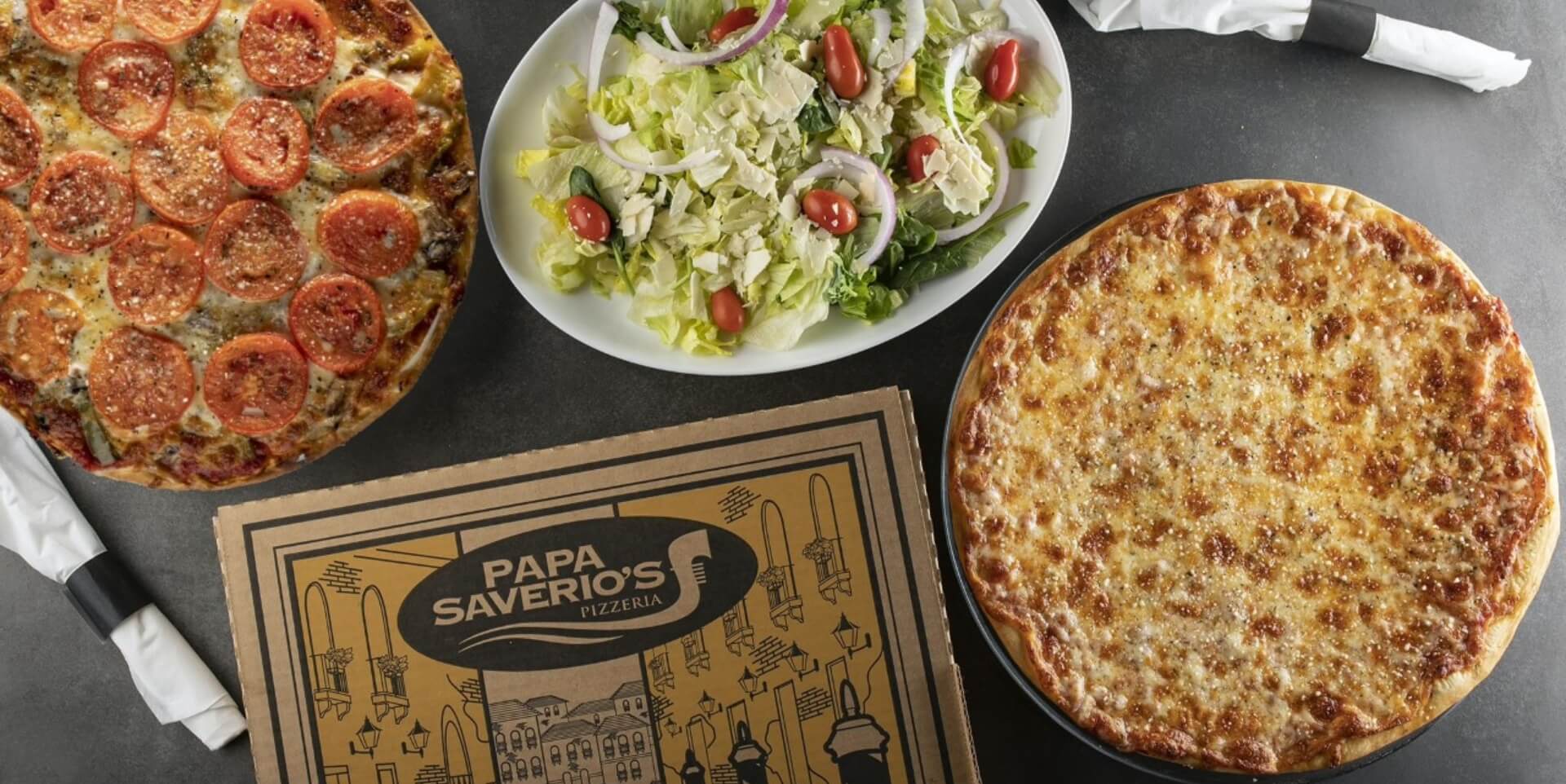 pizza-box-with-two-pizzas-and-salad